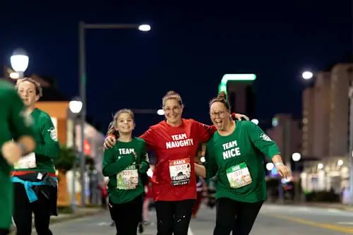 2026 Surf N Santa 5 Miler logo