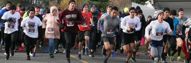 5k Stampede through Clifton logo