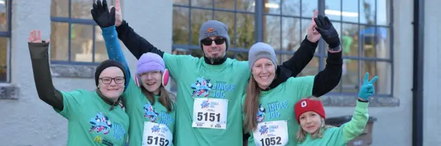 Downtown Jingle Jog 5K logo