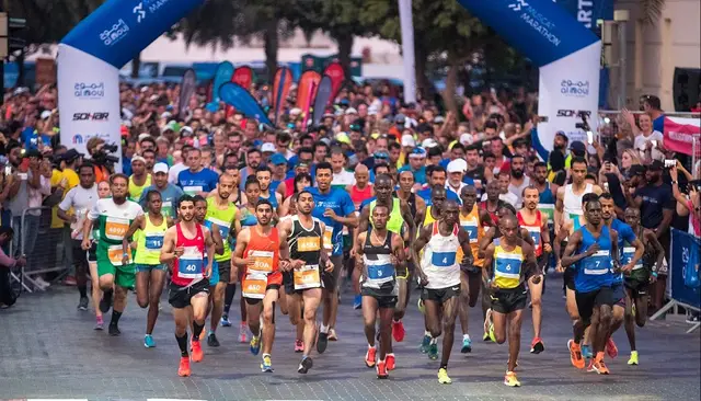 Experience Oman Muscat Marathon logo