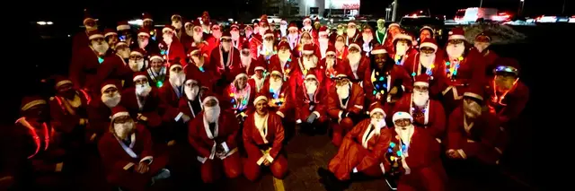 Fleet Feet Poughkeepsie's Red Suit Ramble logo