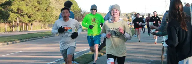 Fleet Feet Turkey Day 8K logo
