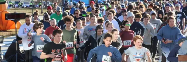 Friends of Middies Athletics Turkey Trot logo