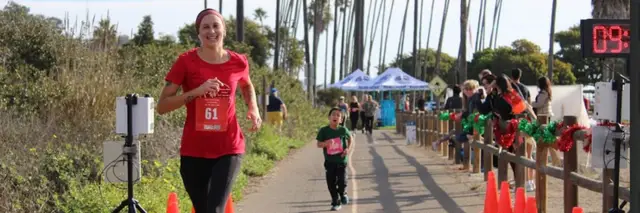 Holiday Half Marathon, 10K, 5K, Kid's 1-Mile logo