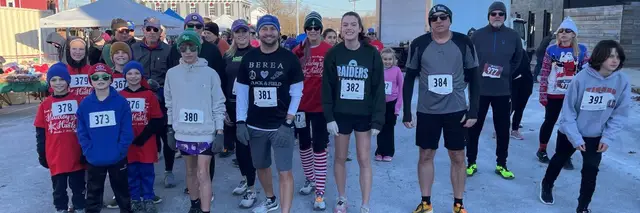 Holiday Hustle 5K logo