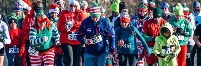 Holiday Hustle 5k logo