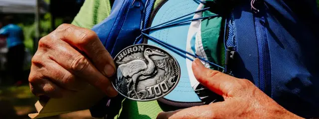 Huron 100 logo