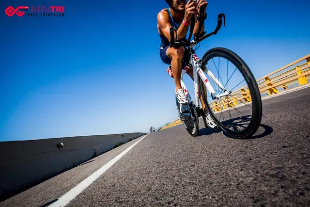 Infinitri 113 Triathlon  Peñíscola logo