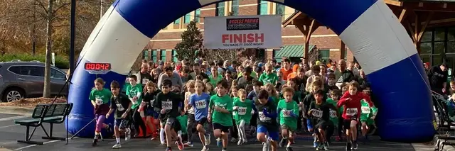 Into the Woods 5K presented by Access Paving and Construction logo