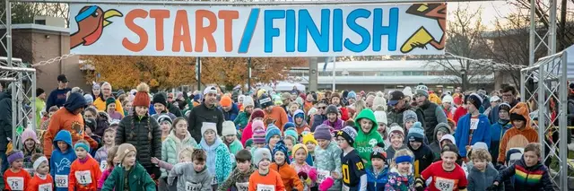 Kids' Food Basket 21st Annual Gobble Wobble 5k Run & Walk logo