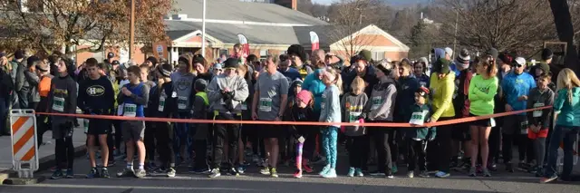 Perry Wellington Turkey Trot logo