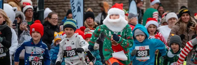 Polar Paws & Santa Claws 5k by Toledo Zoo logo