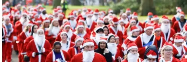 Santa Shuffle 5k & 1 Mile logo