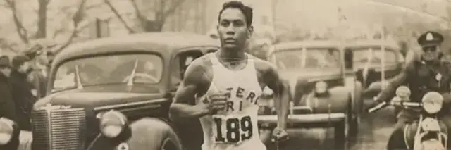 Tarzan Brown Mystic River Run logo