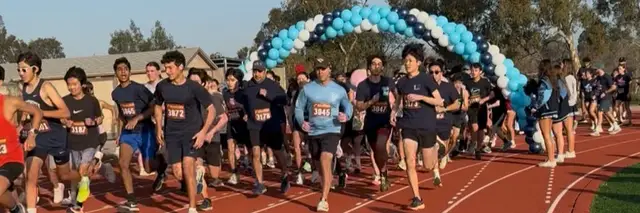 Trojan Trot 5K & Fun Run - All Abilities! logo