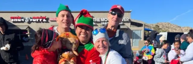 UP AND RUNNING Jingle Bell 5K Run/walk logo