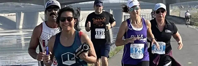 Wrigley River Run & Tadpole Trot logo