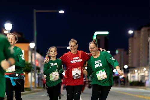 2026 Surf N Santa 5 Miler Logo