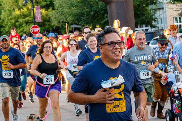9th Annual Garland Guzzler 0.5K Run Logo