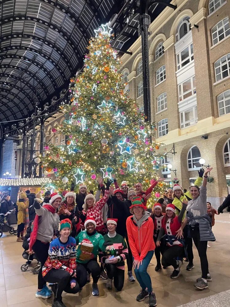 Christmas Lights in the City 10k Tour - Festively Fast Logo