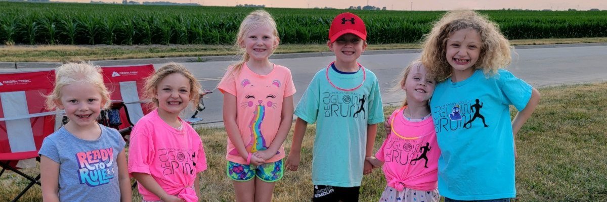 DECU 5K Glow Run for Empowerment Opportunity Center Logo