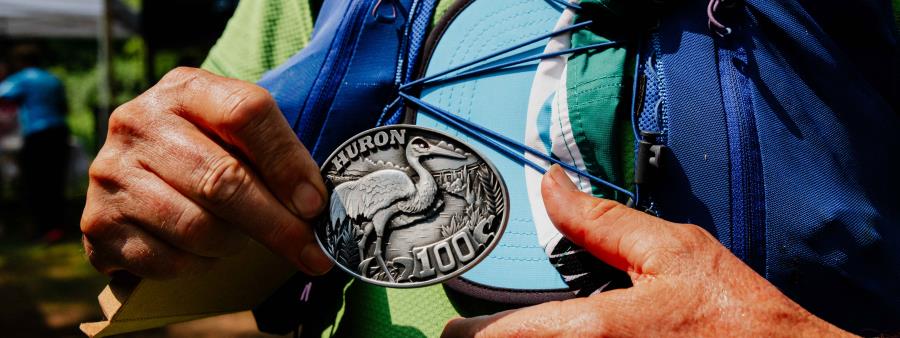 Huron 100 Logo