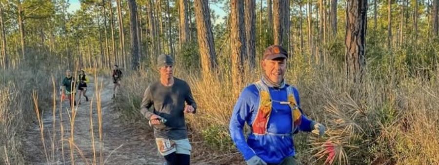 In the Woods 30A 50K Logo