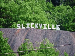 Slickville 5k Coal Mine Climb & 2 Mile Fun Walk Logo