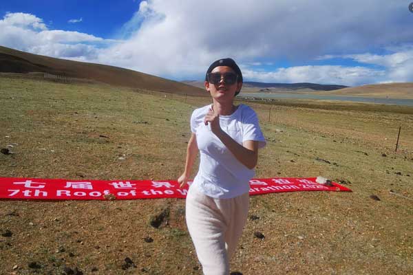 The Roof of the World Marathon (ROWM) - Tibet China Logo